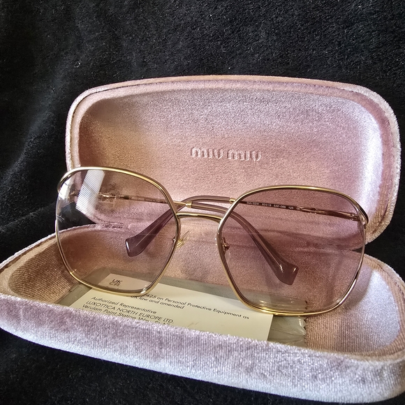 Miu Miu Gold and Pink Glasses with Chic Design